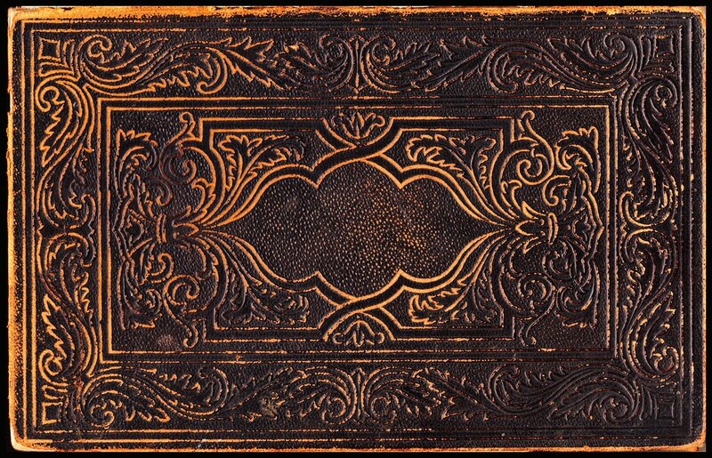 ornate leather book cover