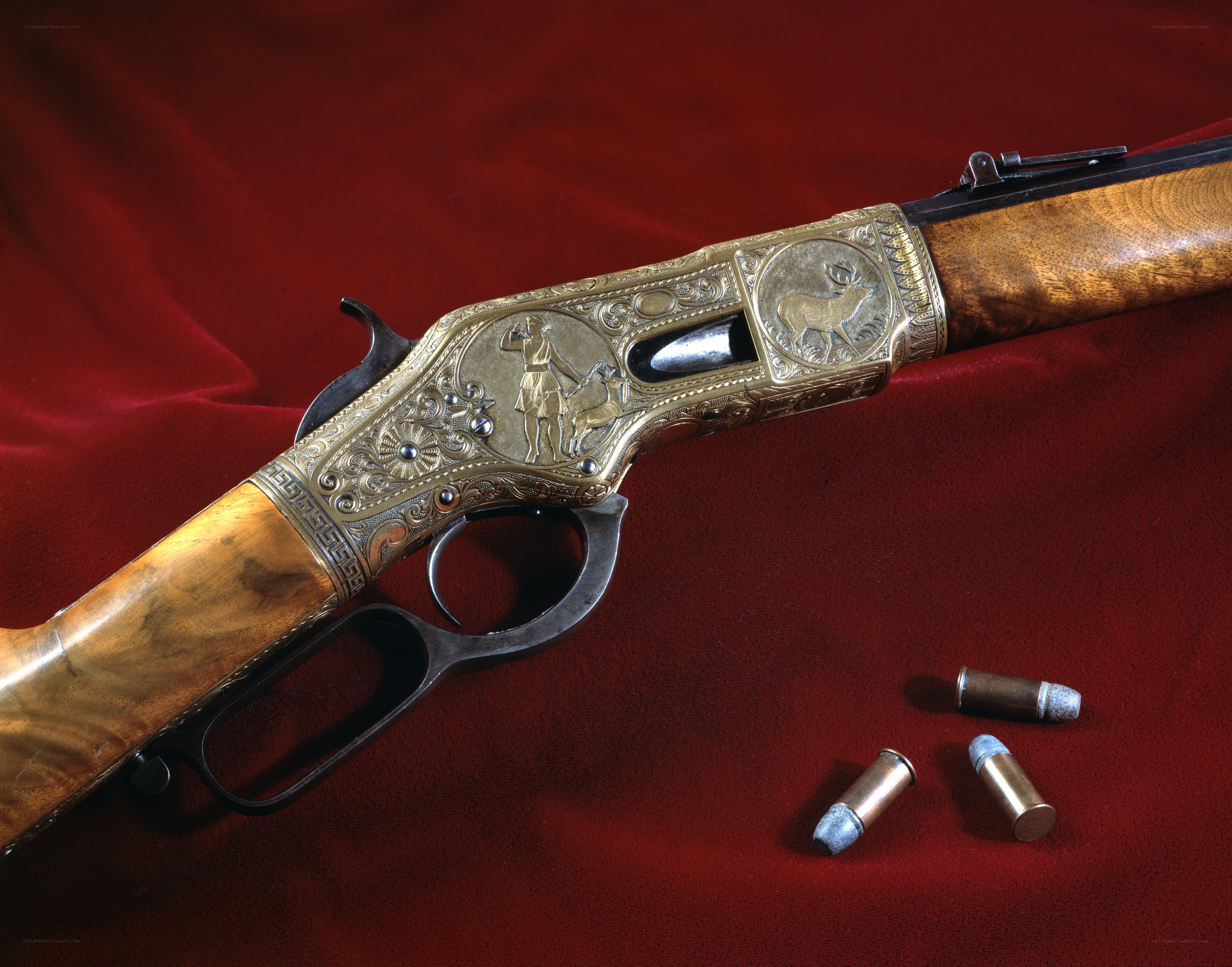 ornate lever-action rifle