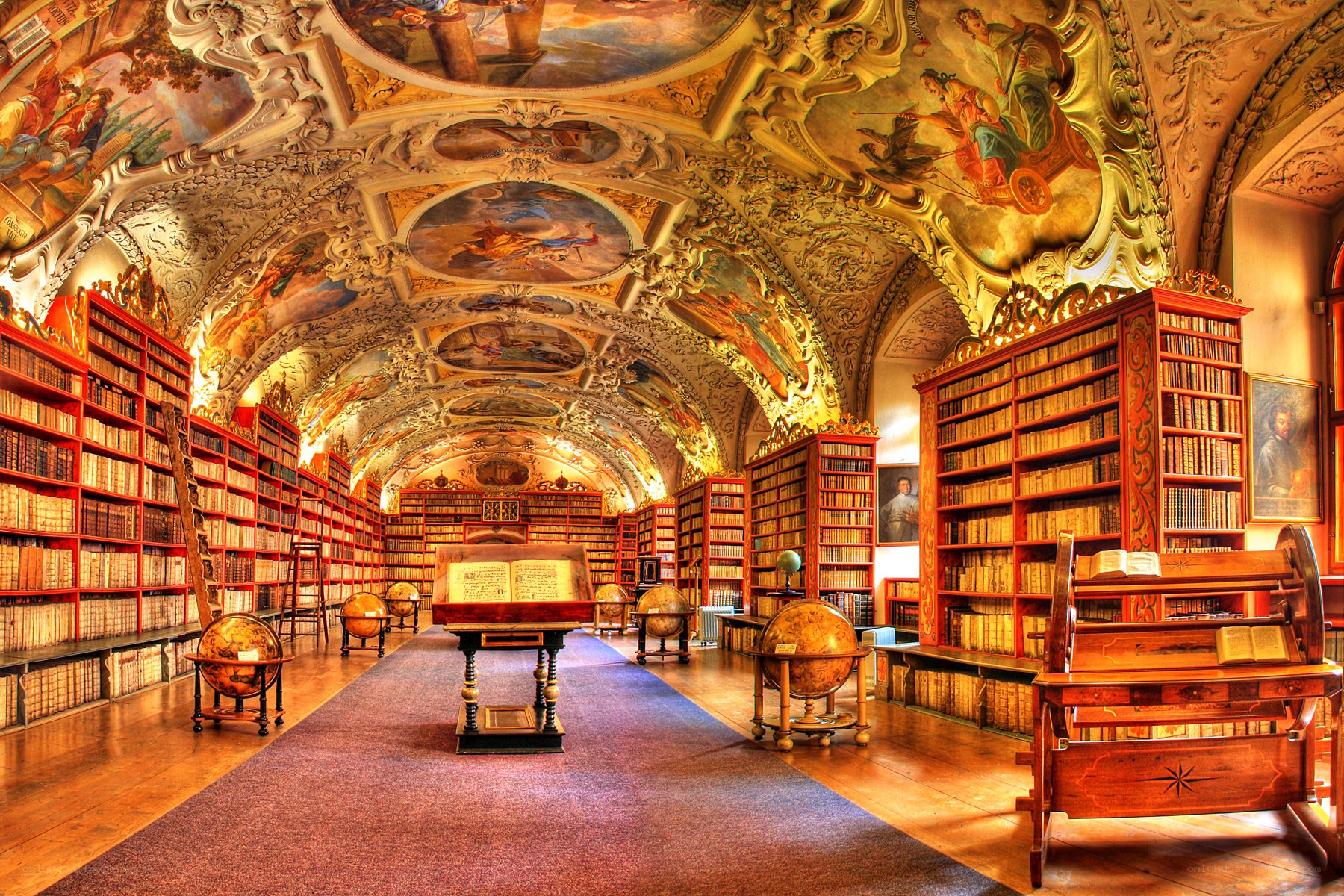 ornate library with frescoes
