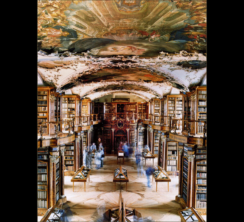 ornate library with painted ceiling