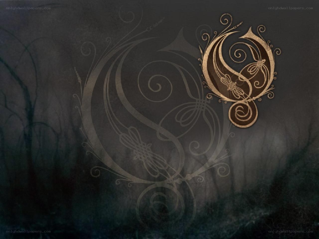 ornate logo on dark background
