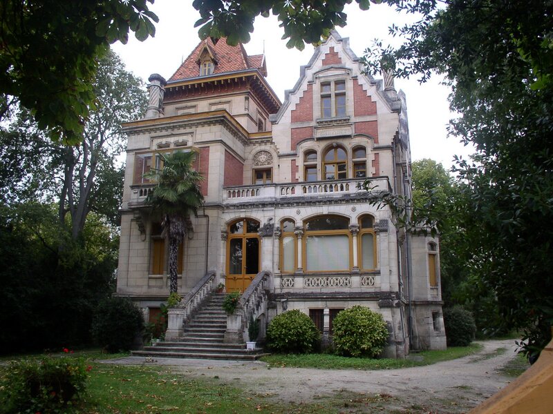 ornate mansion with stone staircase