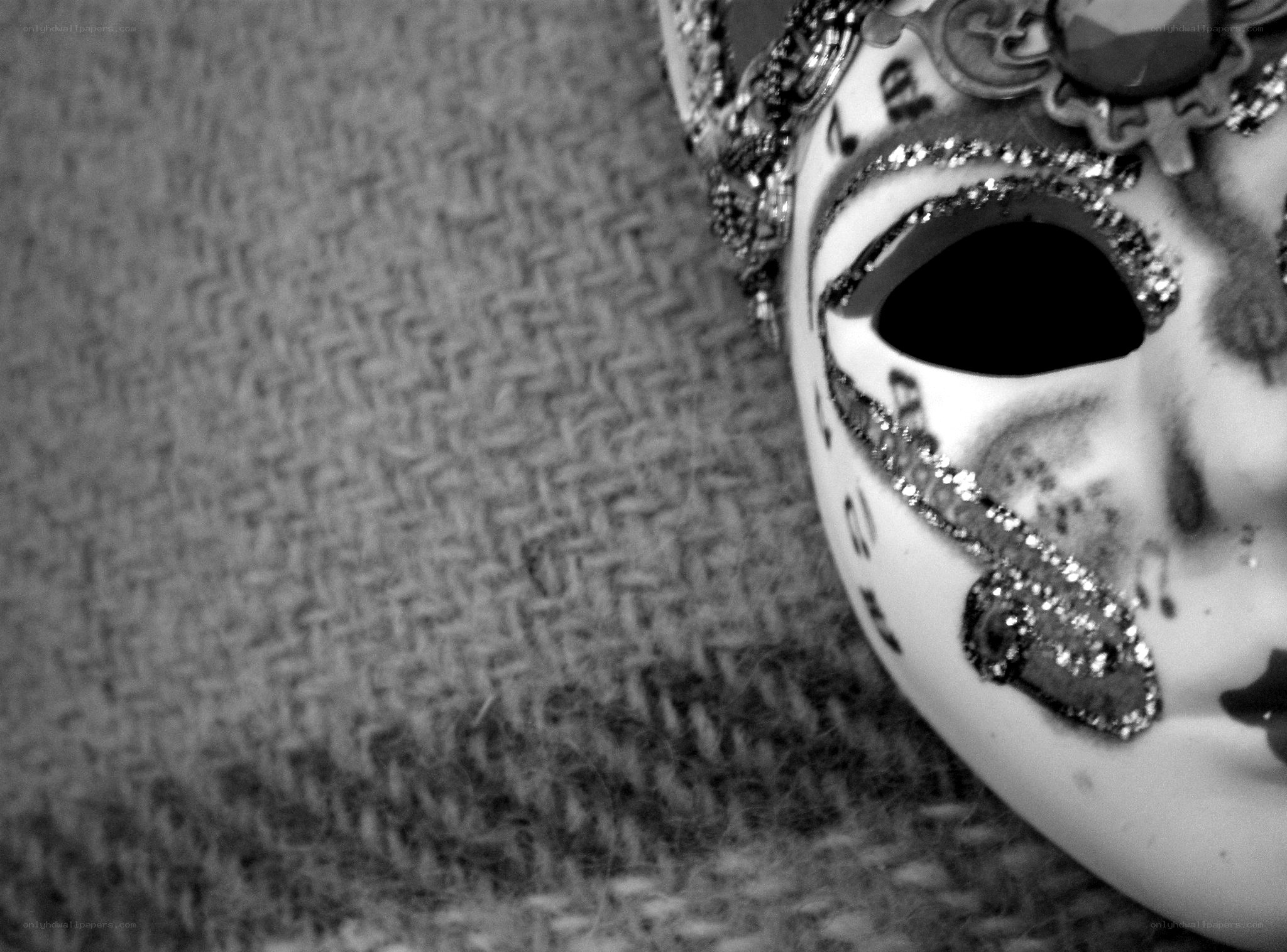 ornate mask on burlap