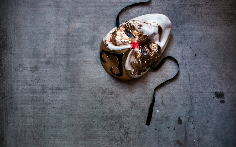 ornate mask on concrete