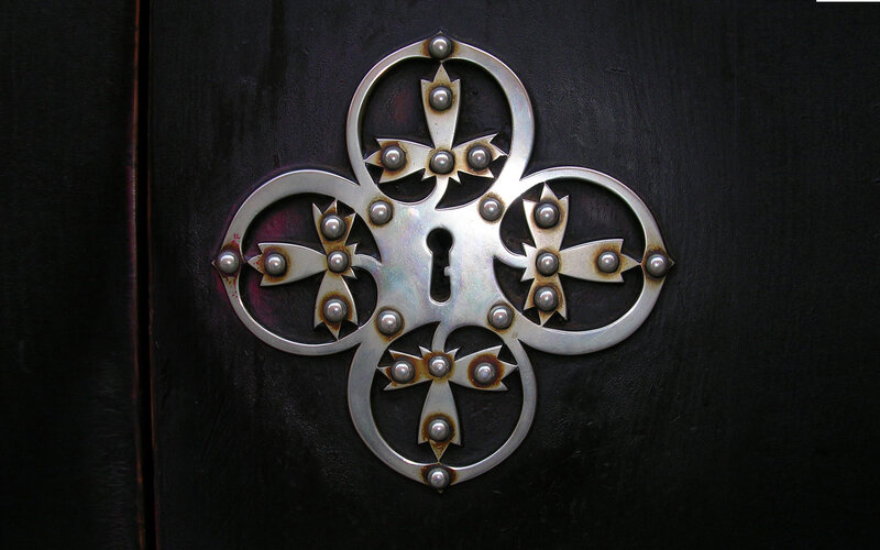 Ornate Metal Door Plate — Black, Dramatic, Photograph, Keyhole