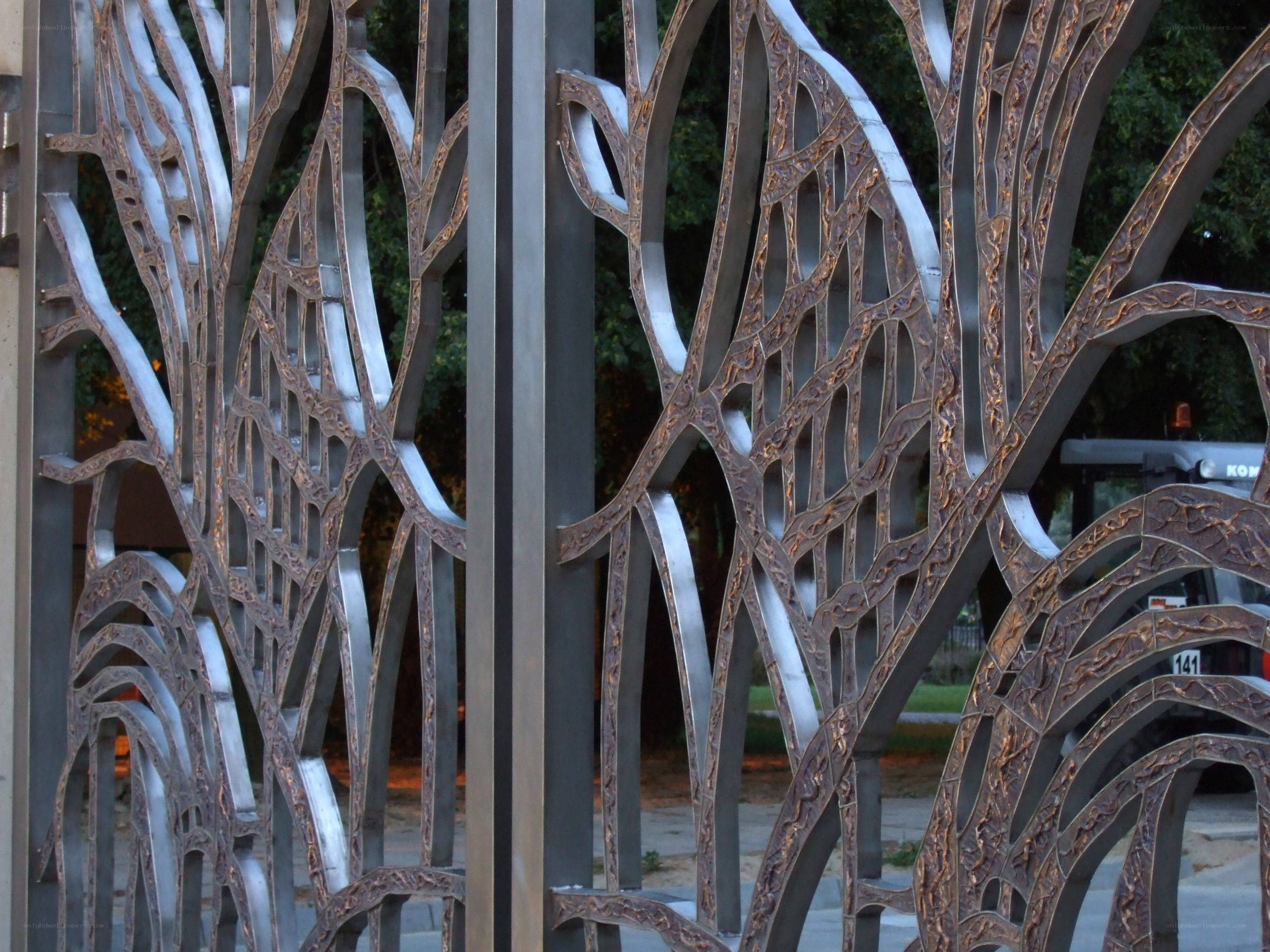 ornate metal gate with tree design