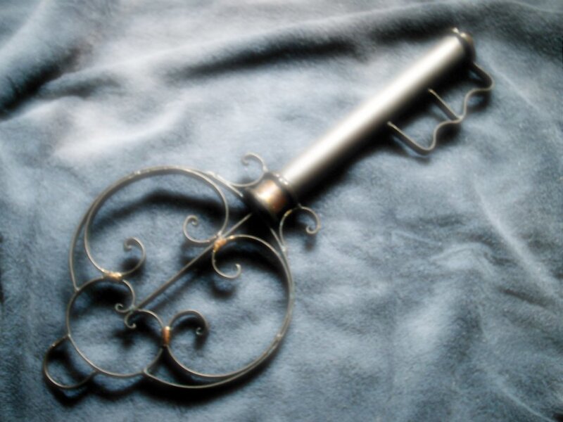 ornate metal key on fabric