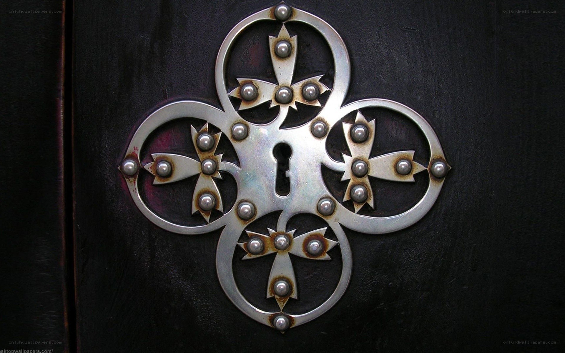 ornate metal keyhole cover