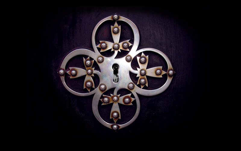 ornate metal keyhole cover