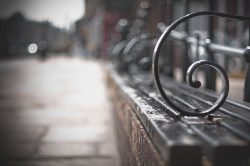ornate metal railing on a city street