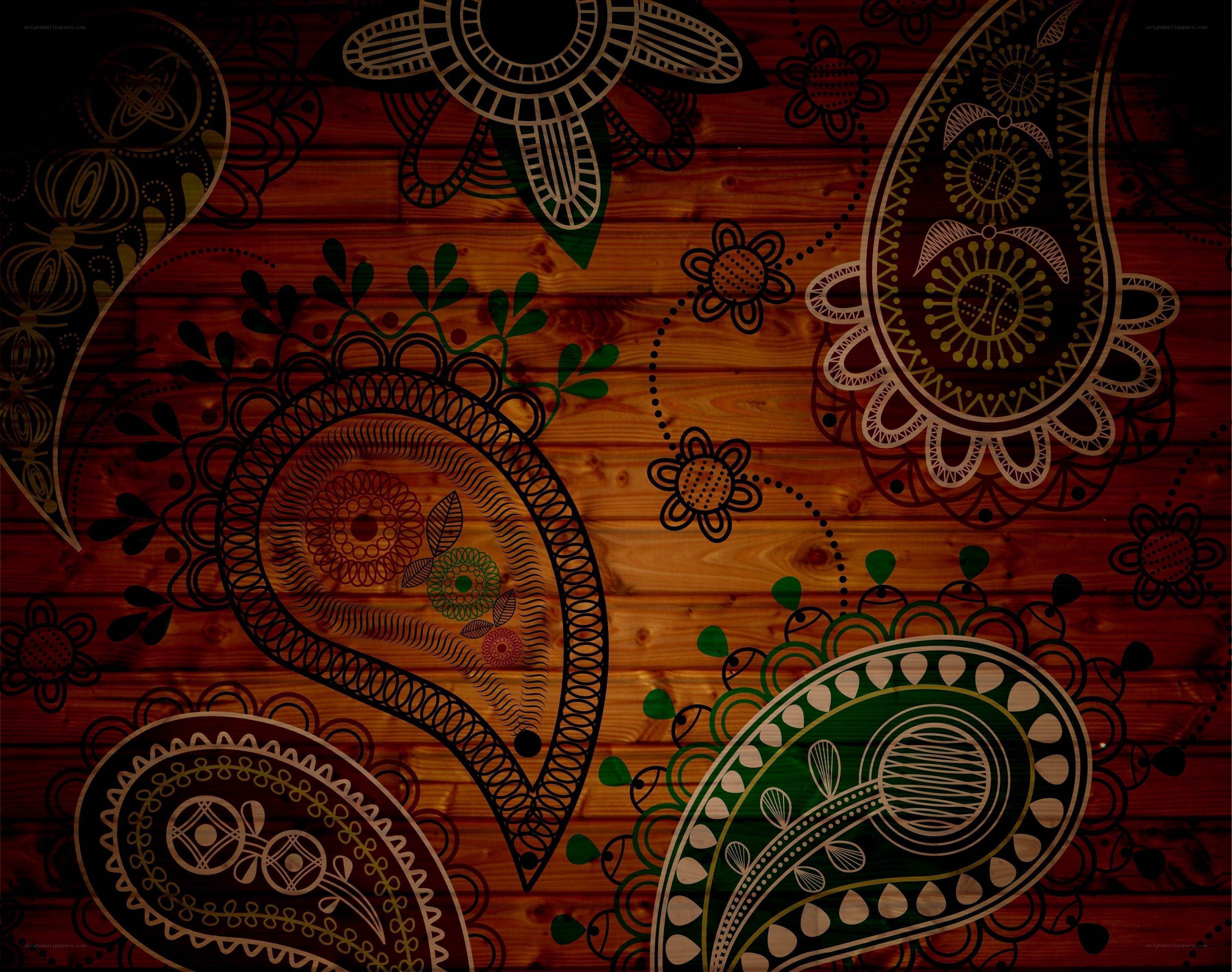 ornate paisley pattern on wood