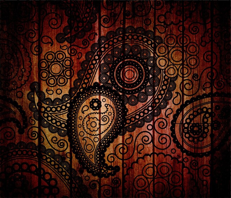 ornate paisley pattern on wood