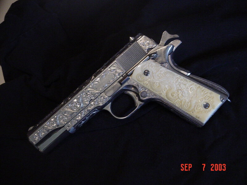 ornate pistol on black cloth