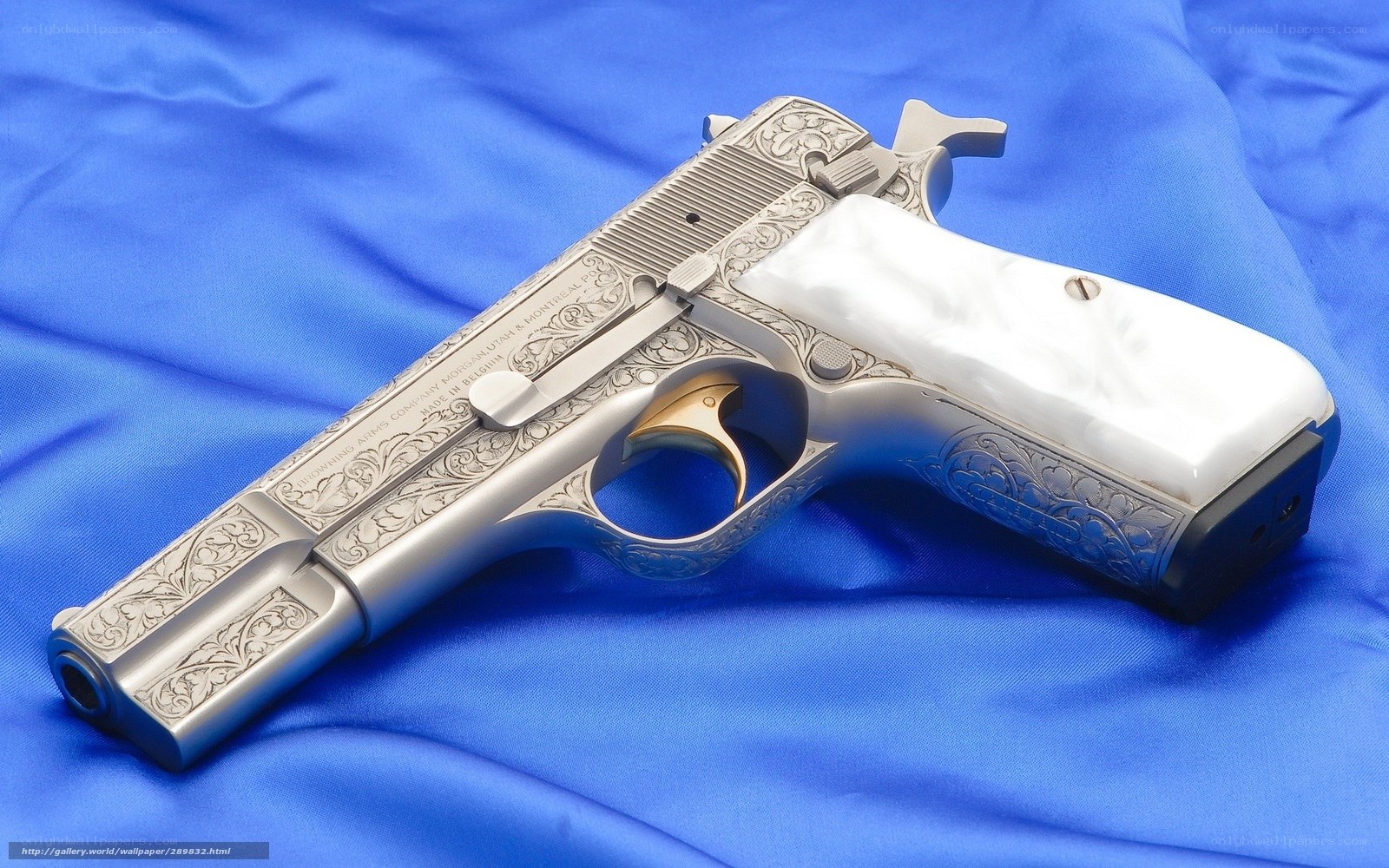 ornate pistol on blue cloth