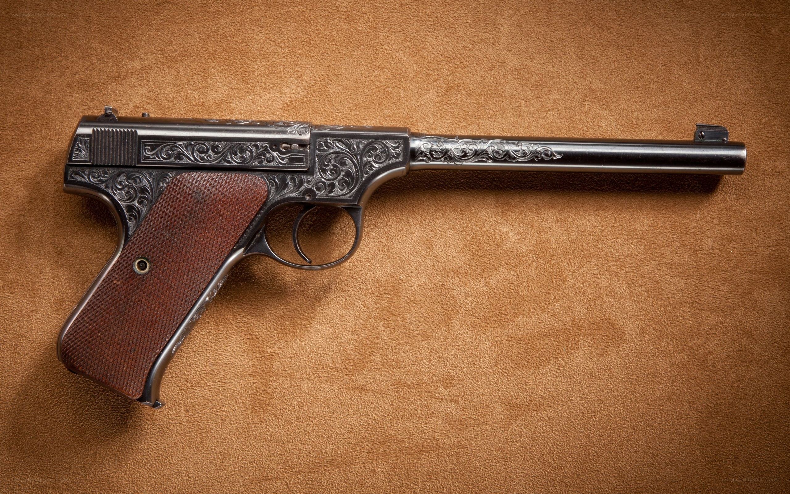 ornate pistol on leather