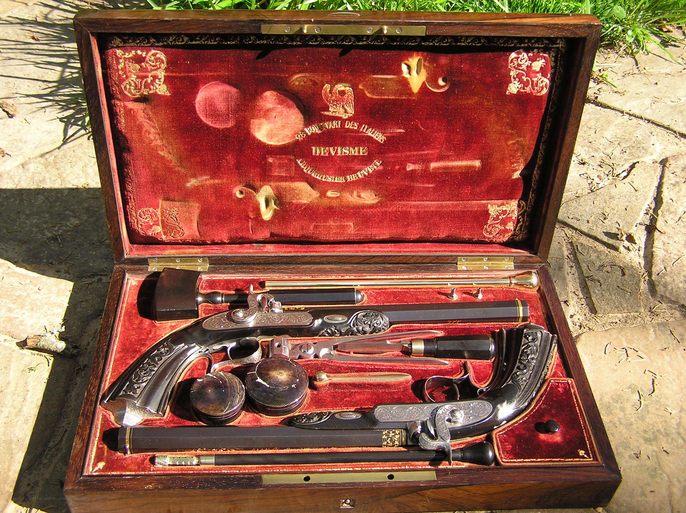 ornate pistol set in case