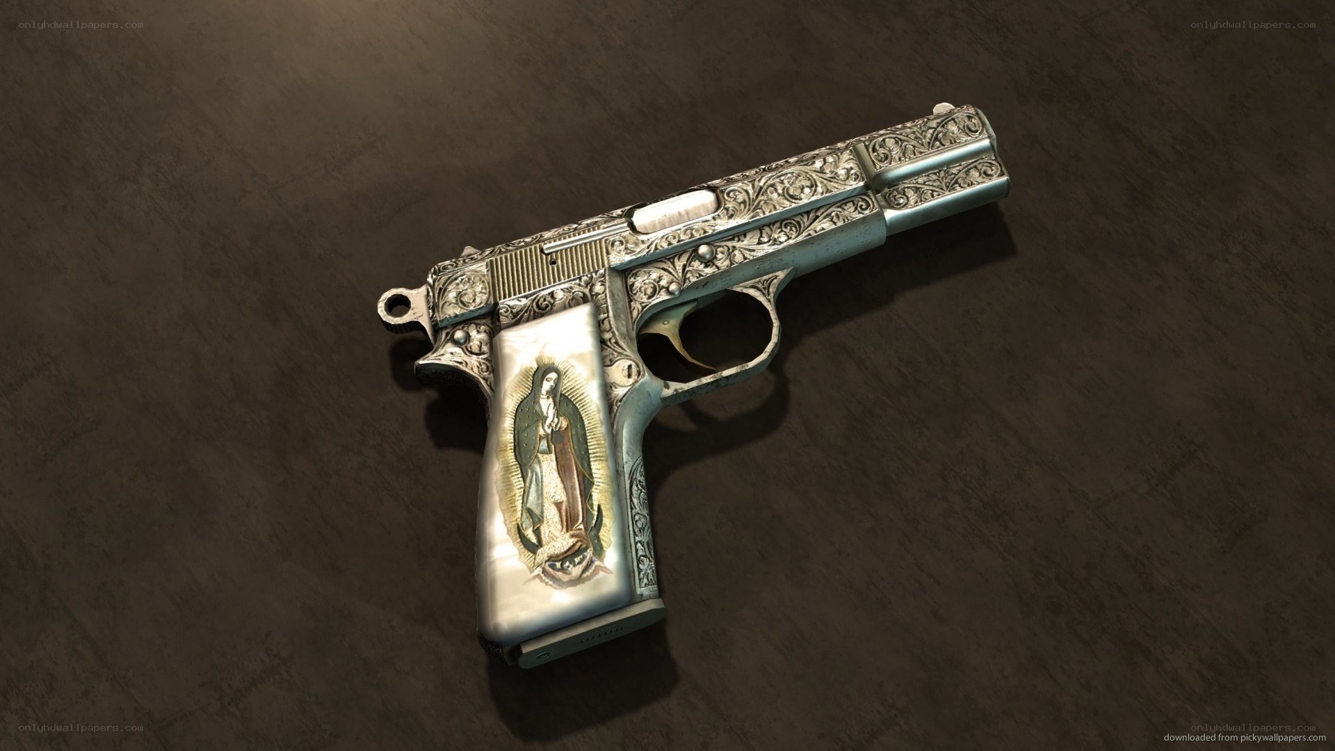 ornate pistol with religious image