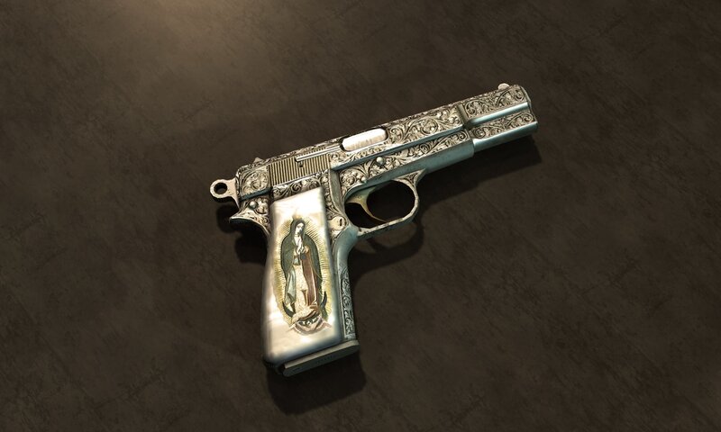 ornate pistol with religious image