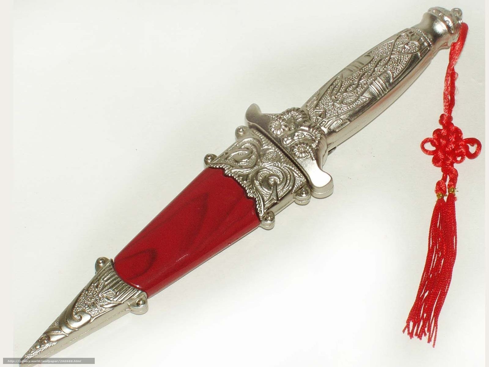 ornate red dagger with tassel