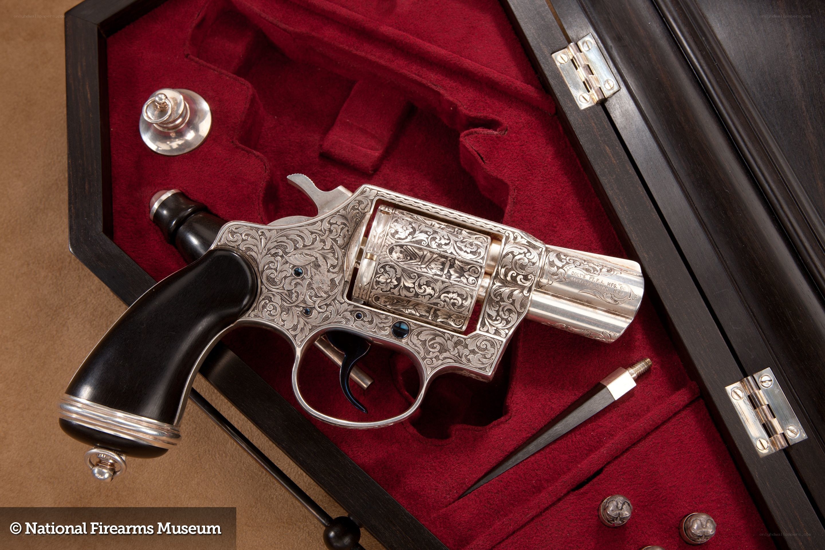 ornate revolver in case
