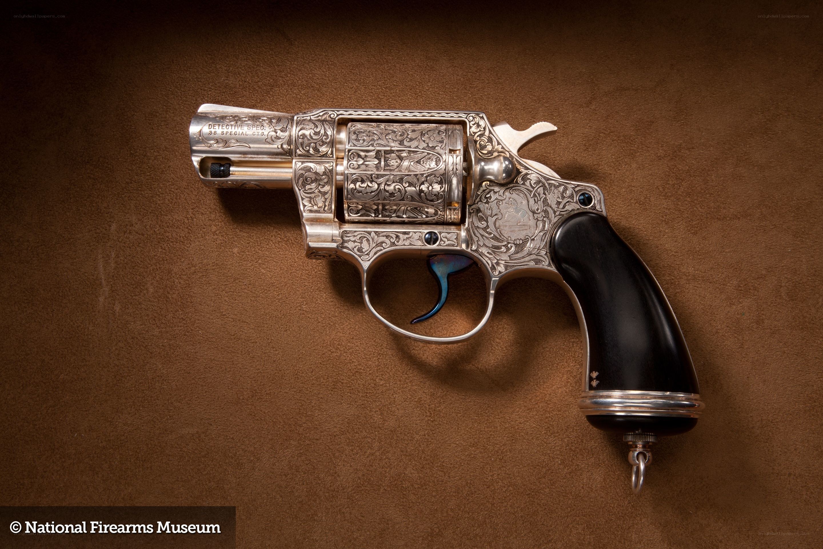 Ornate revolver on display