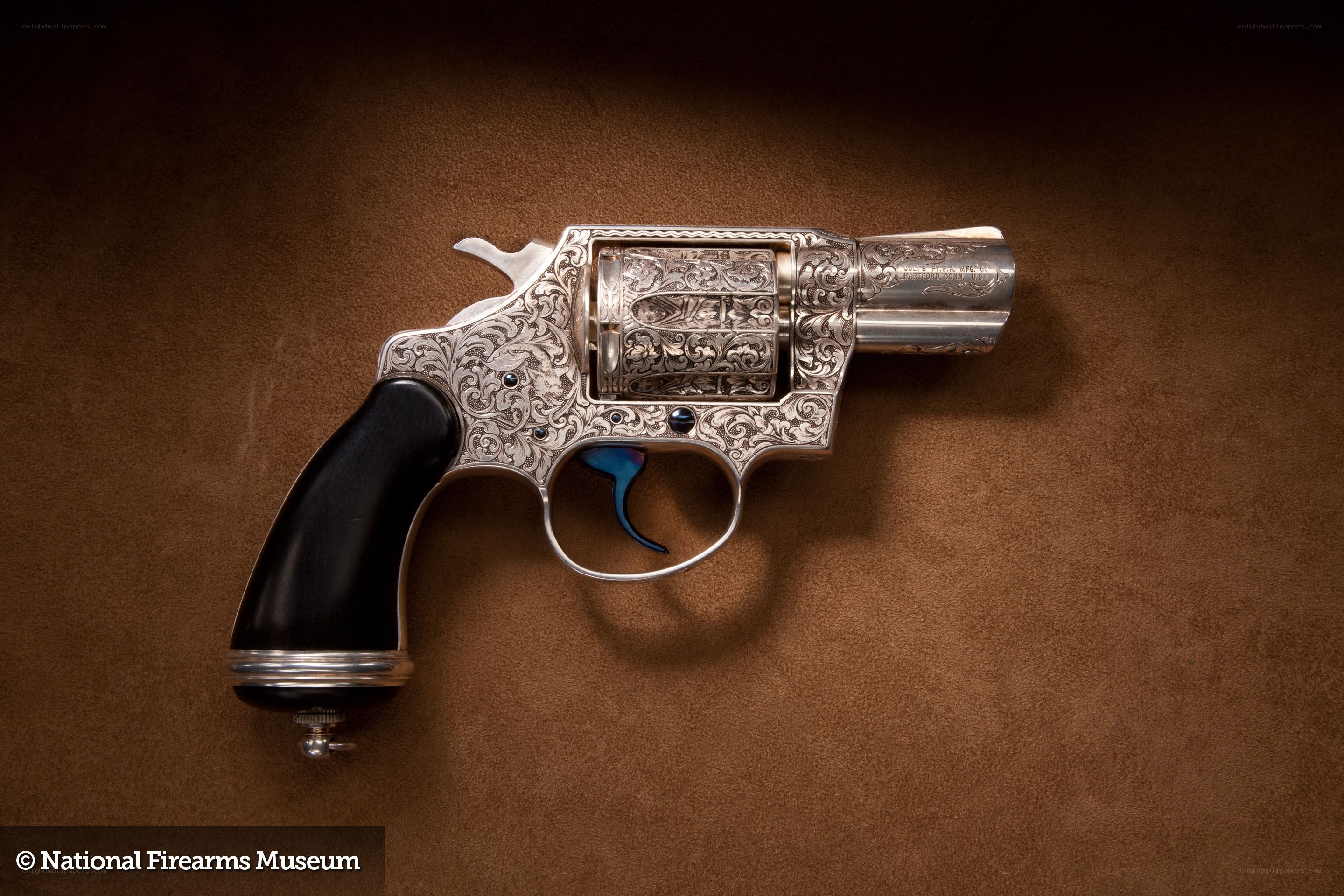 Ornate revolver on display