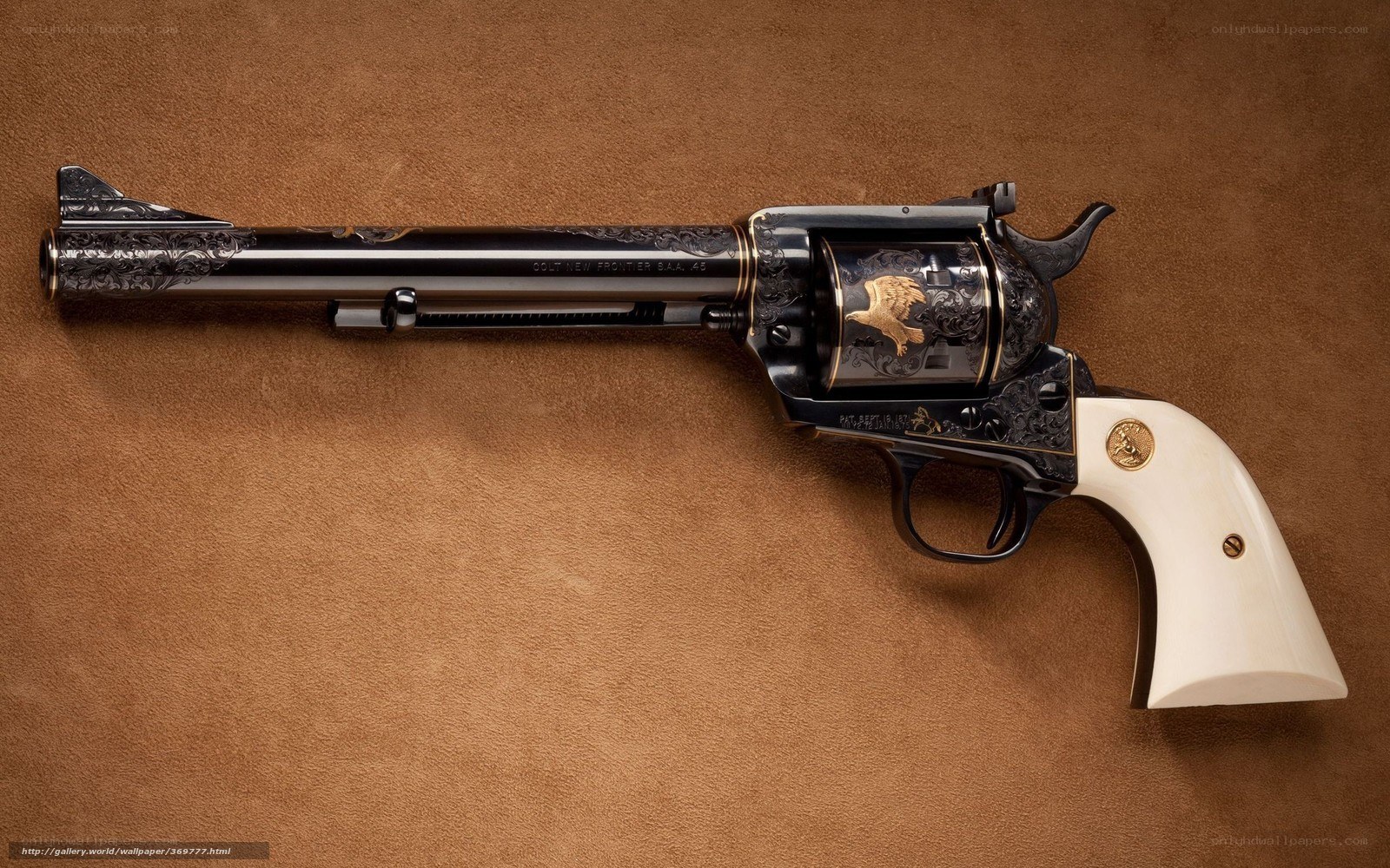 ornate revolver on leather