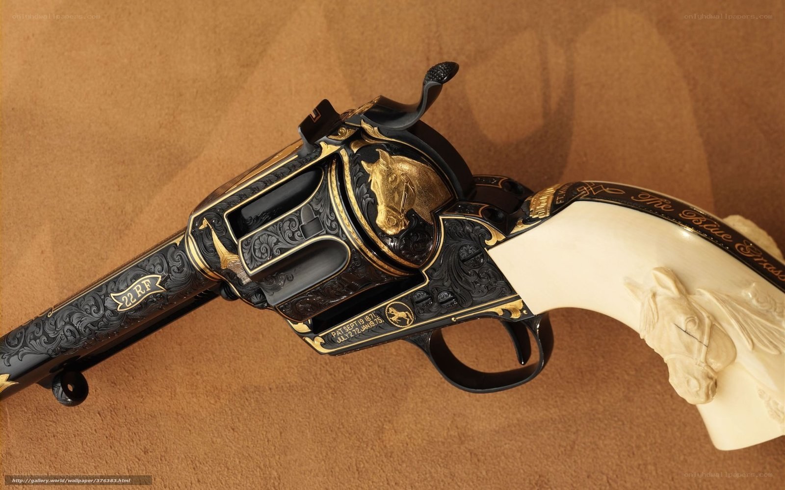 ornate revolver with horse motif