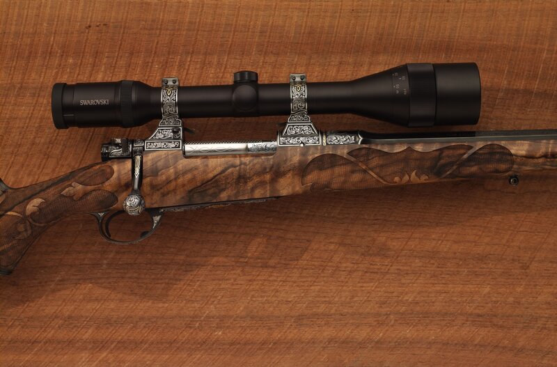 Ornate Rifle on Wood