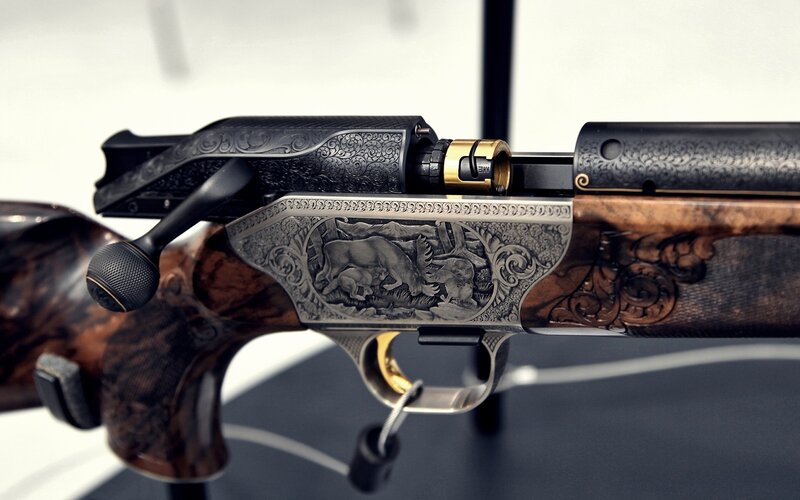 ornate rifle with carvings