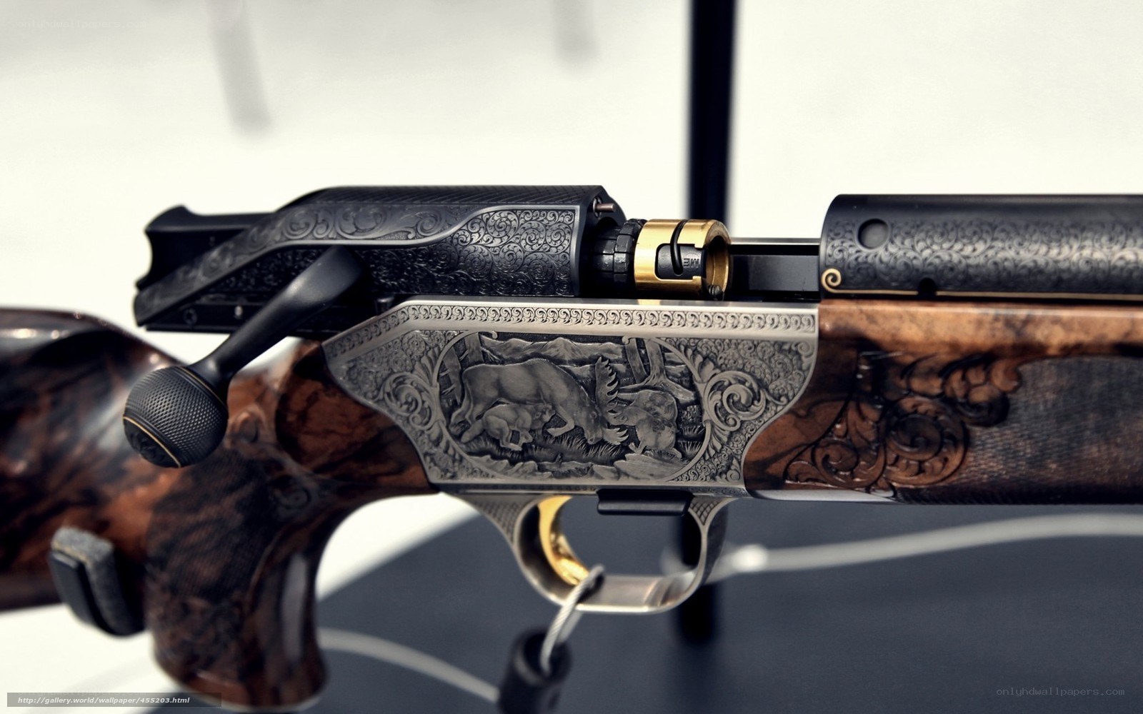 ornate rifle with carvings