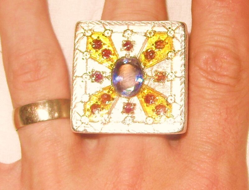 ornate ring with gemstones