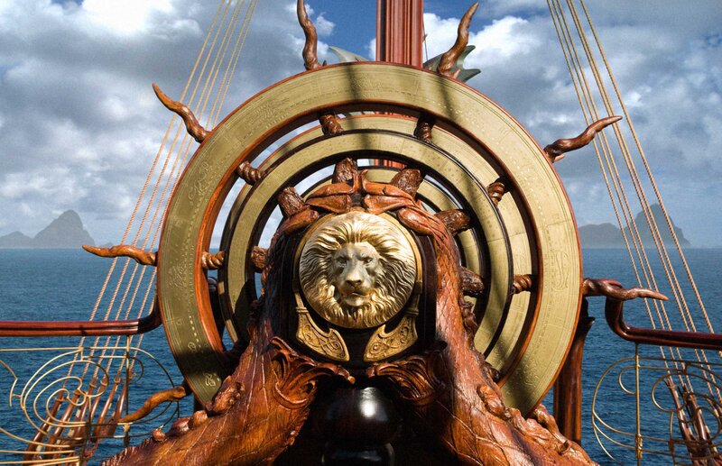 ornate ship's wheel with lion emblem