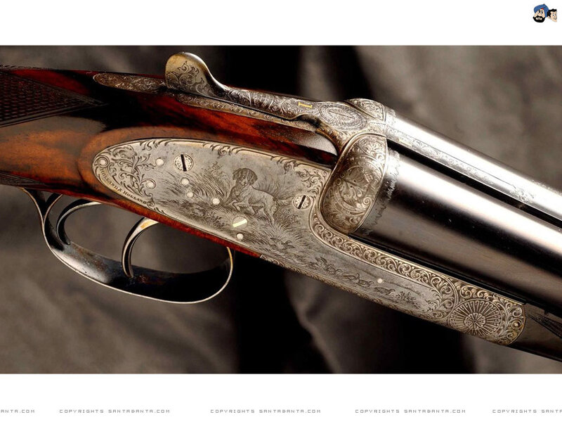 ornate shotgun with engraving