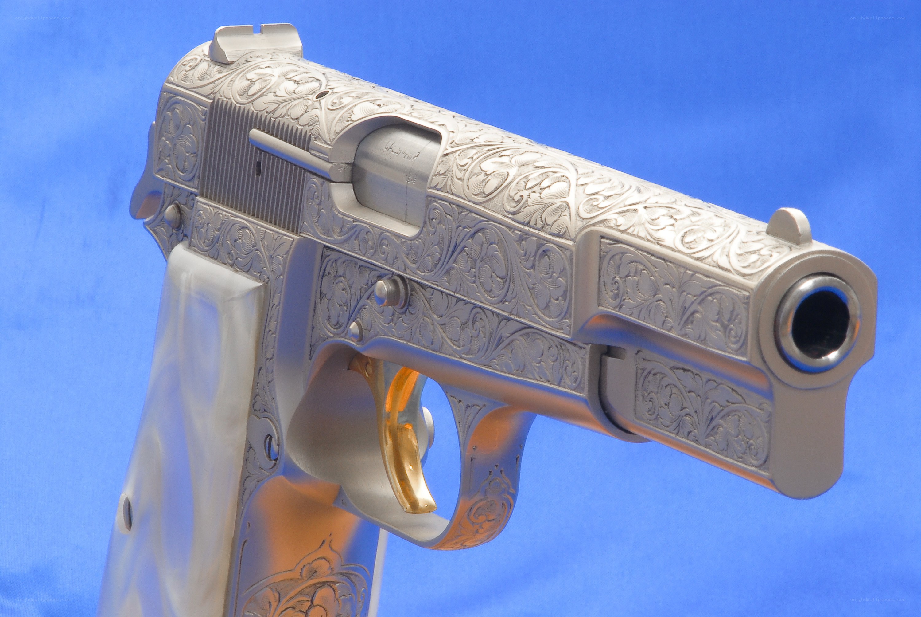 ornate silver pistol