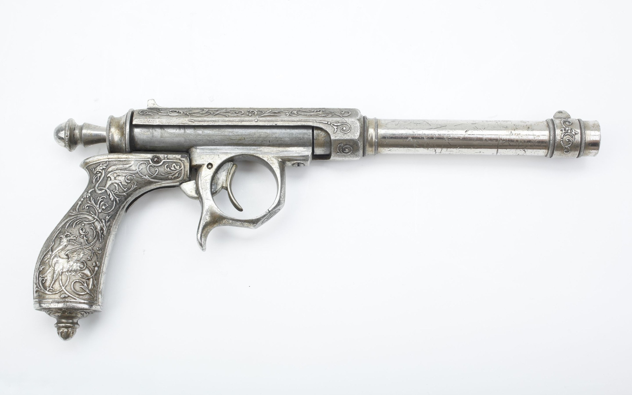 ornate silver pistol