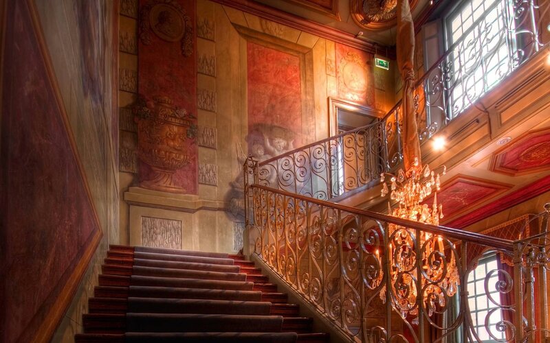 ornate staircase in grand hall