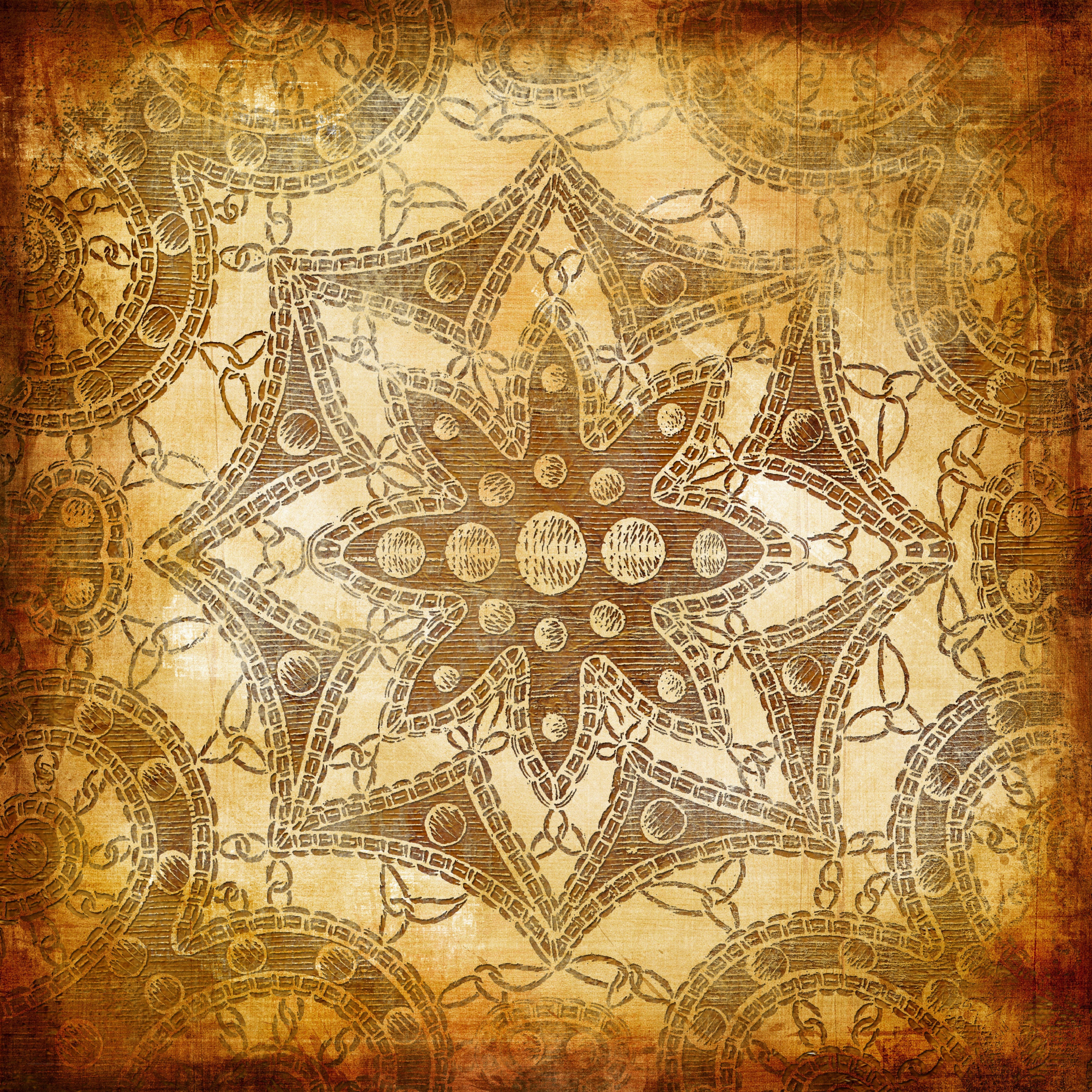 ornate star pattern on aged paper