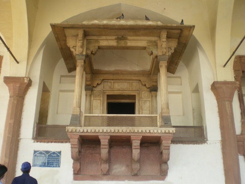 ornate stone balcony in historic building