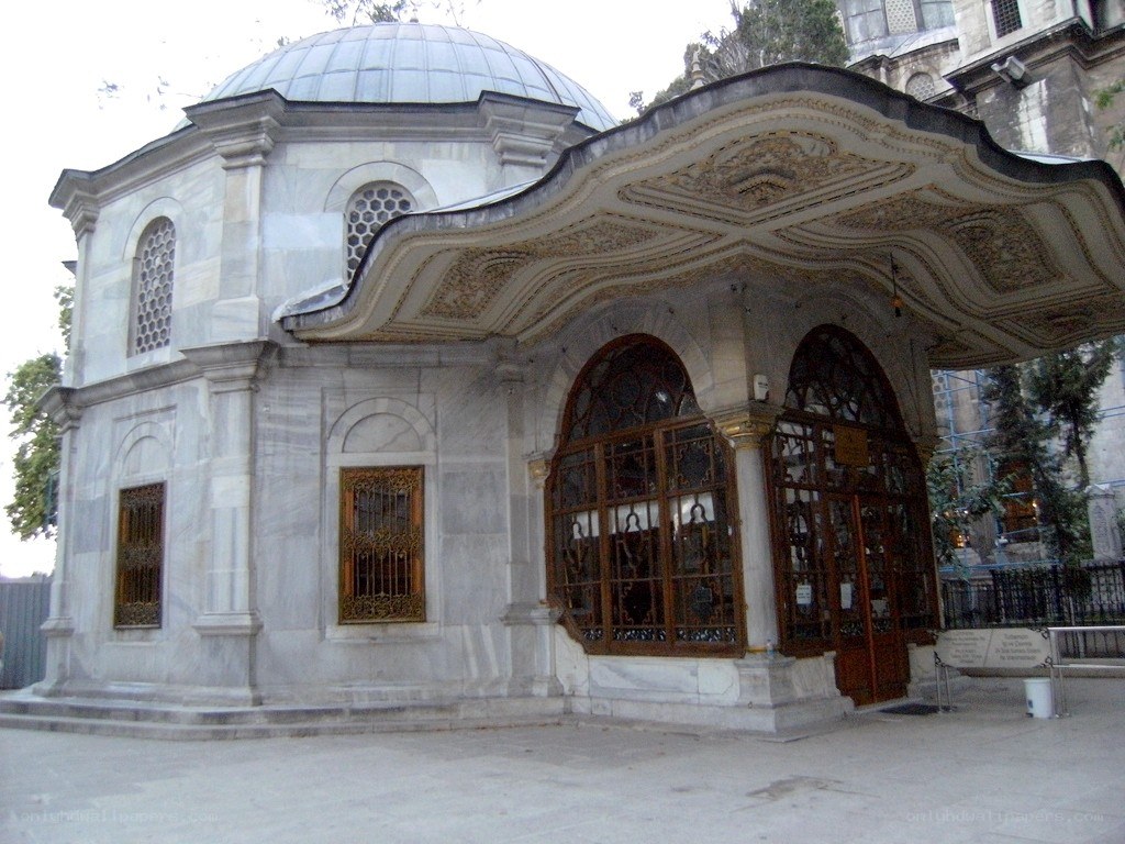 ornate stone building with dome