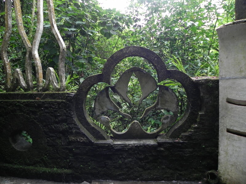ornate stone carving in garden