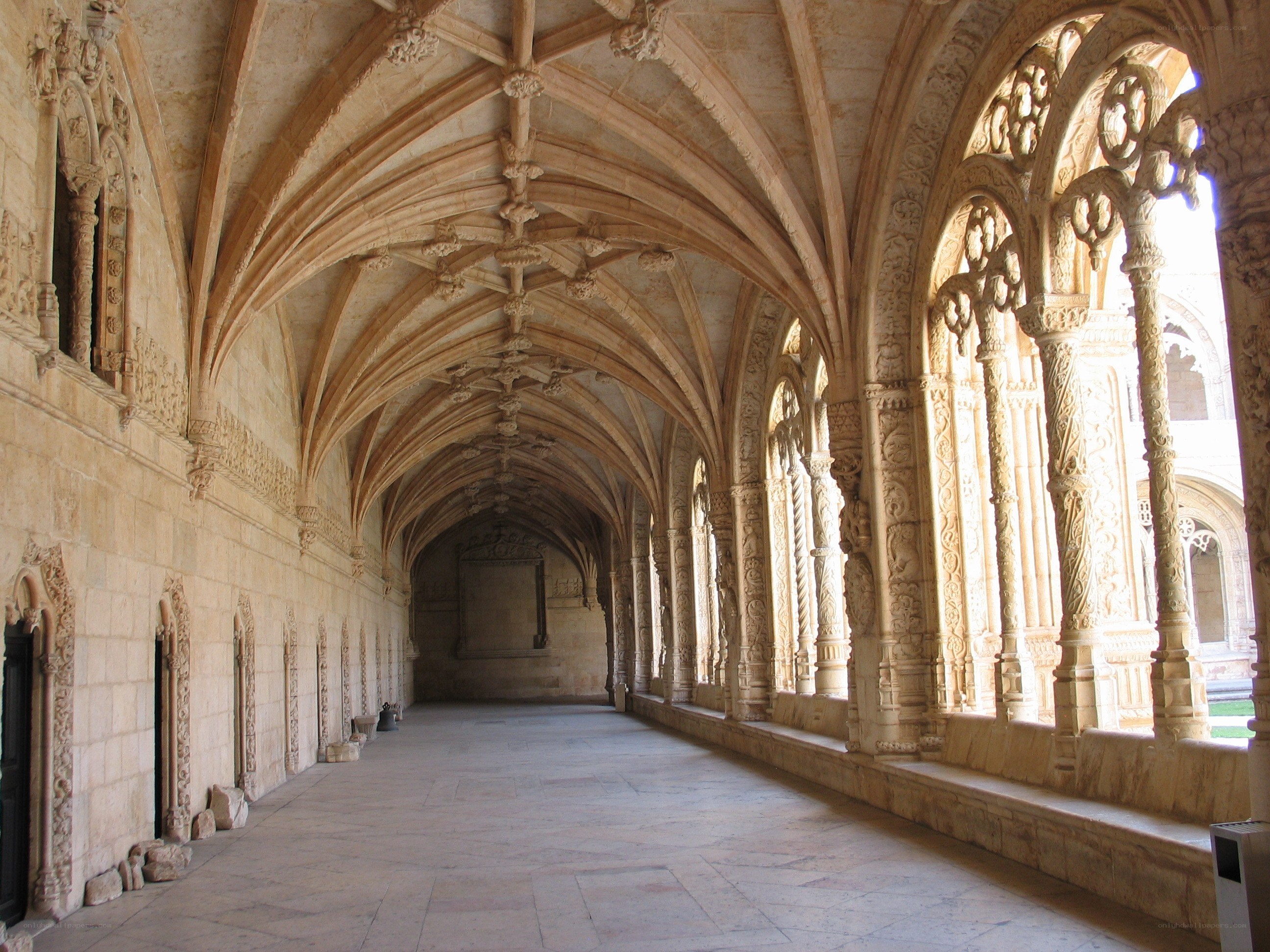 ornate stone cloister corridor