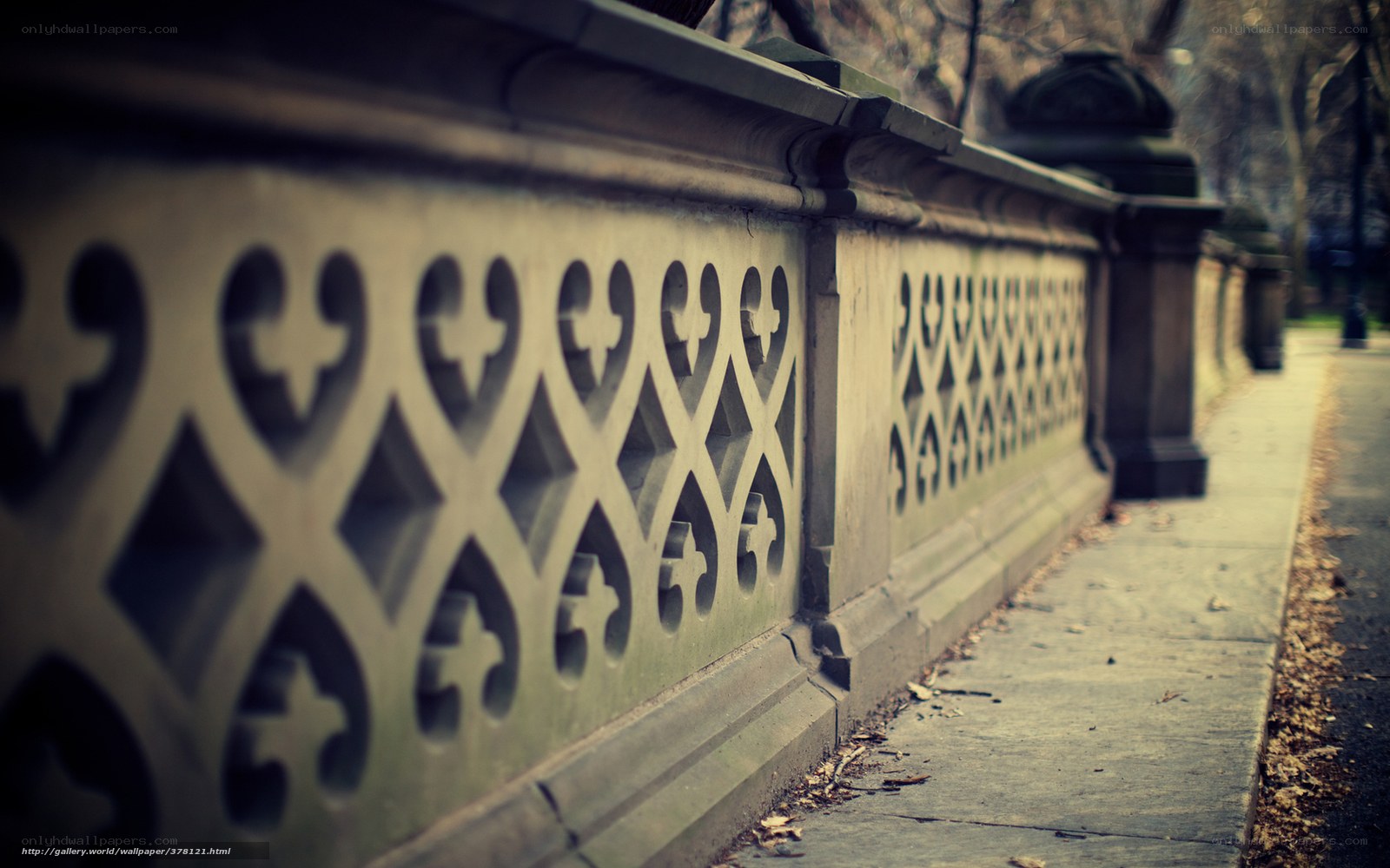 ornate stone wall in park