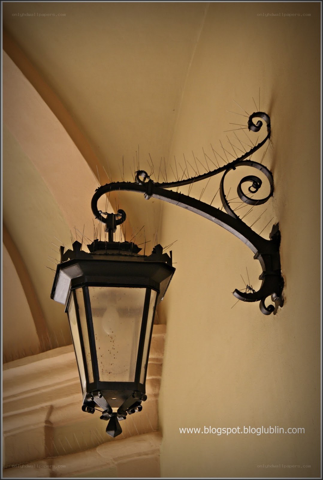 ornate street lamp with spikes