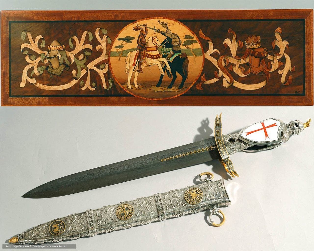 ornate sword and inlaid panel