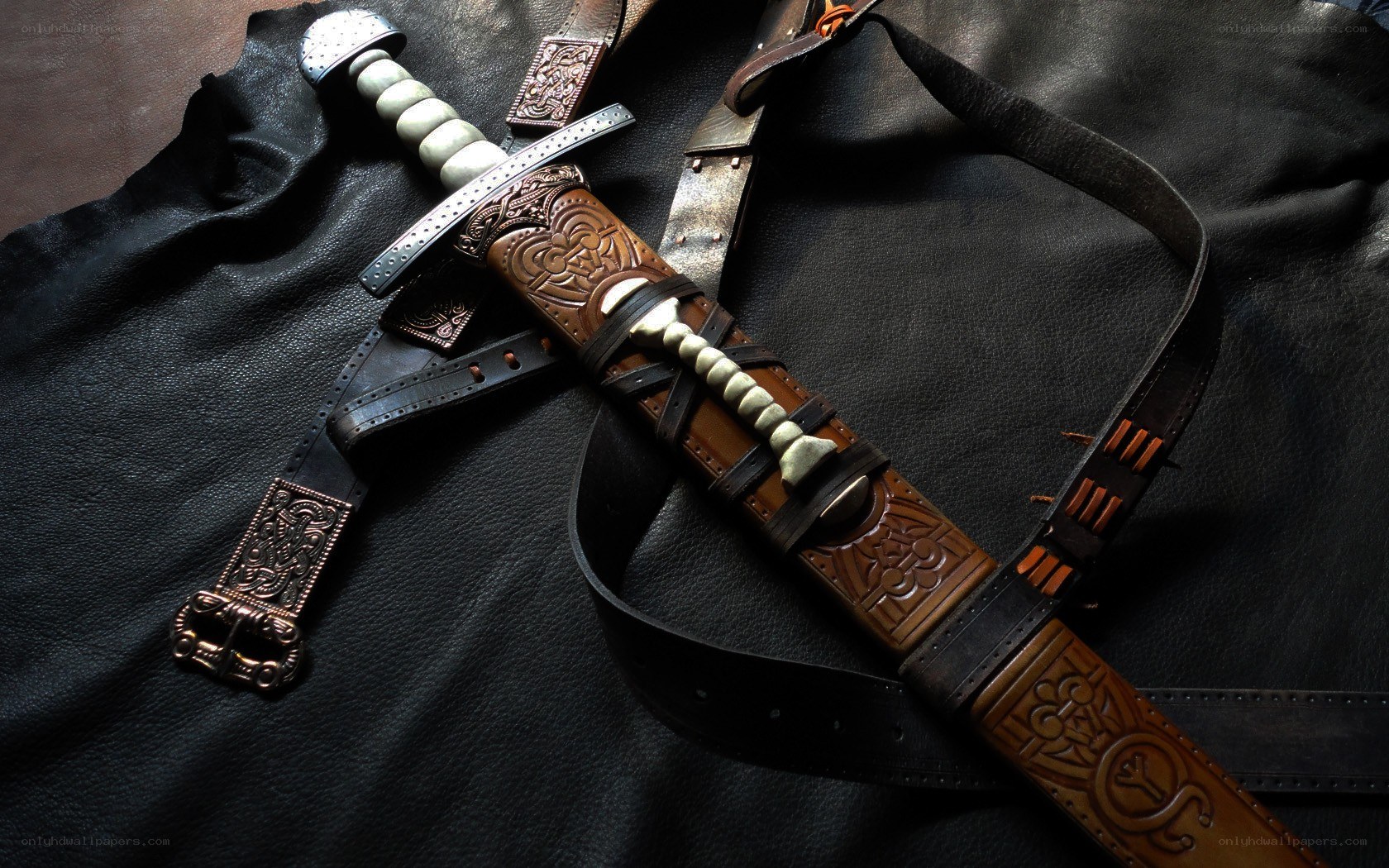 ornate sword in leather sheath
