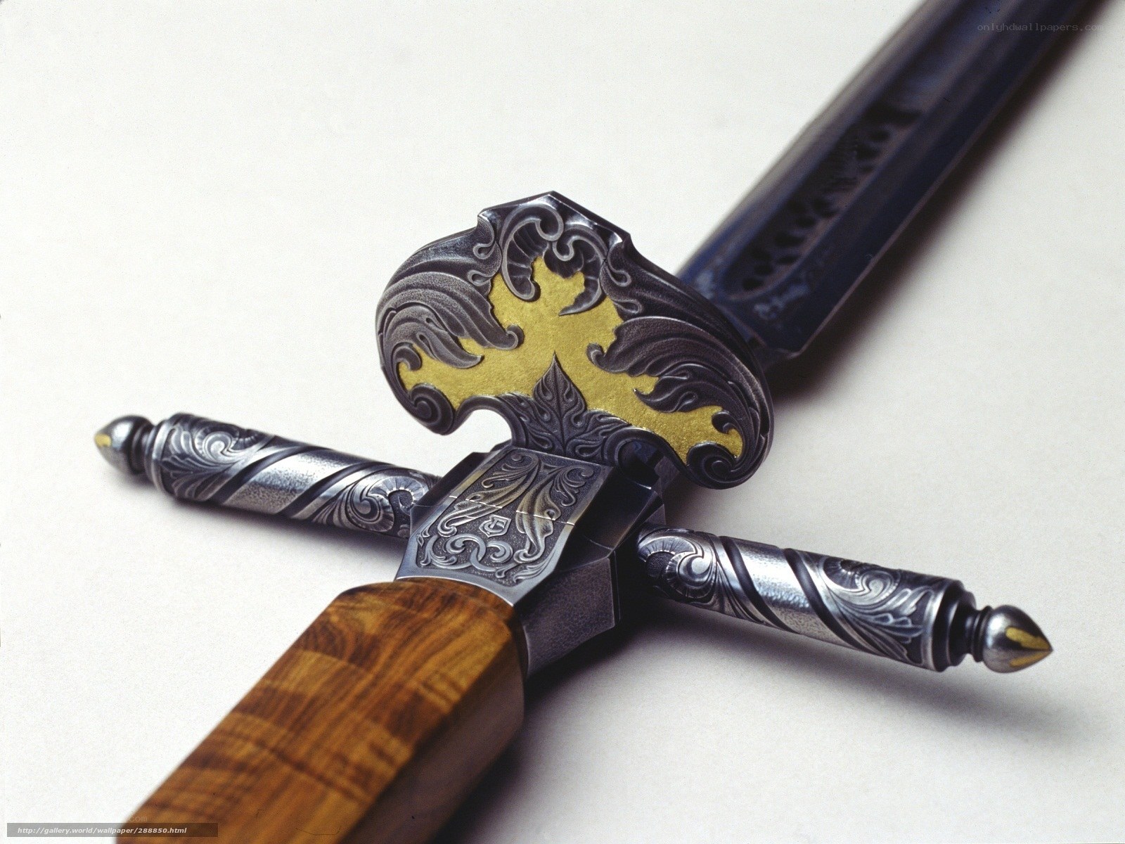 ornate sword with gold cross