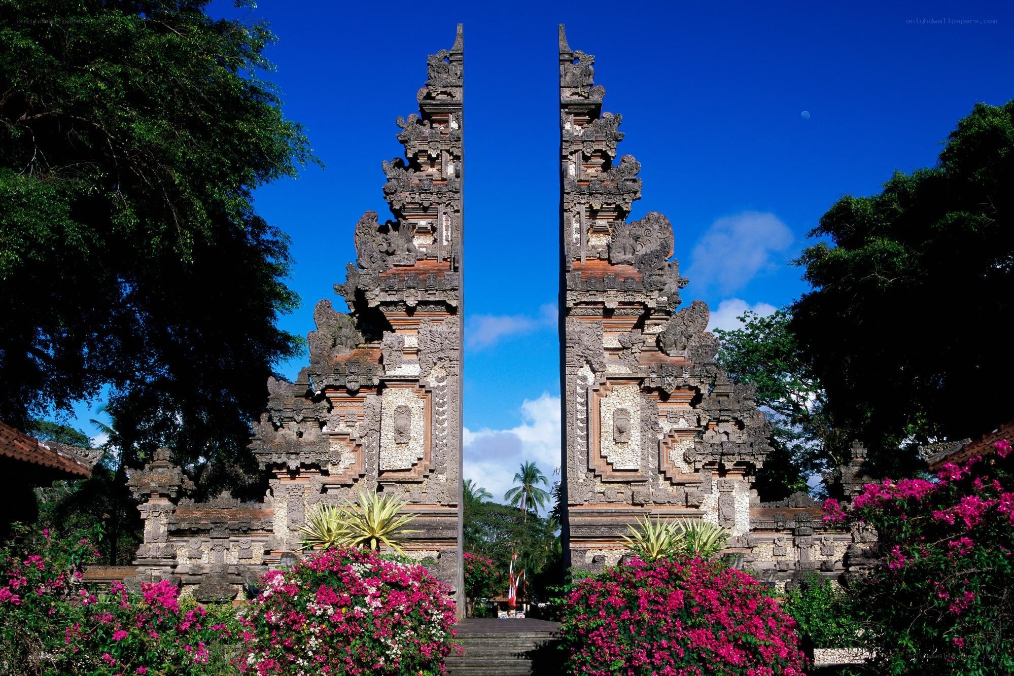 ornate temple gate with flowers