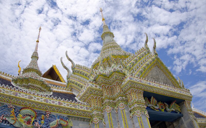 ornate temple roof against sky