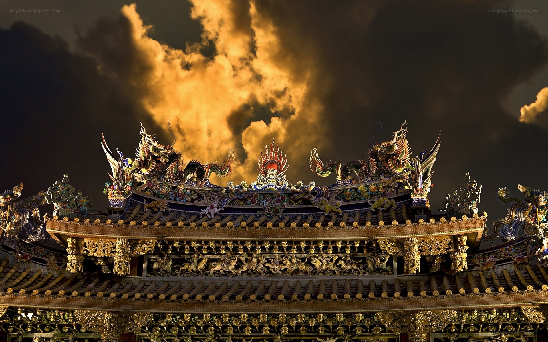ornate temple roof at dusk